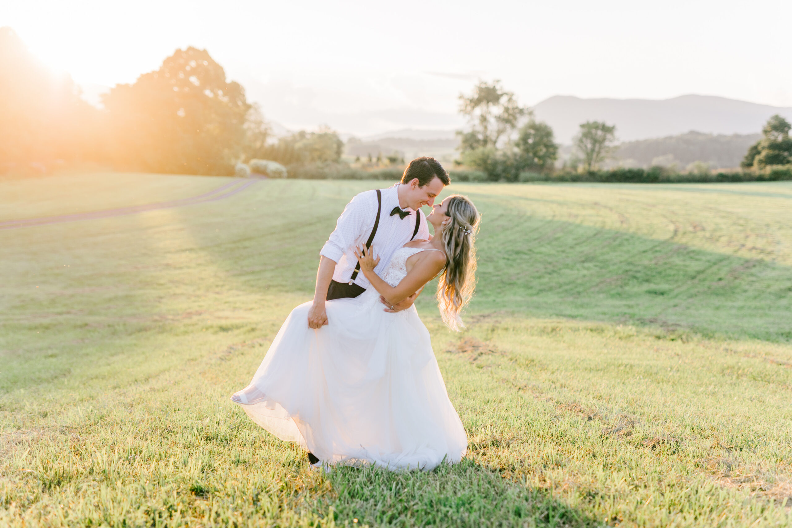golden hour photo of the bride and groom at big spring farm