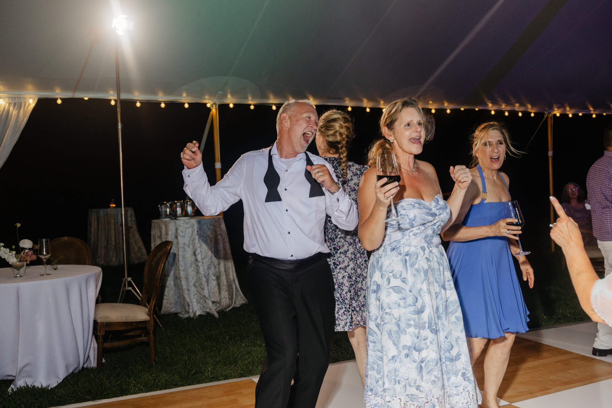 Private Residence Summer Wedding 45 Groom and guests on dance floor dancing