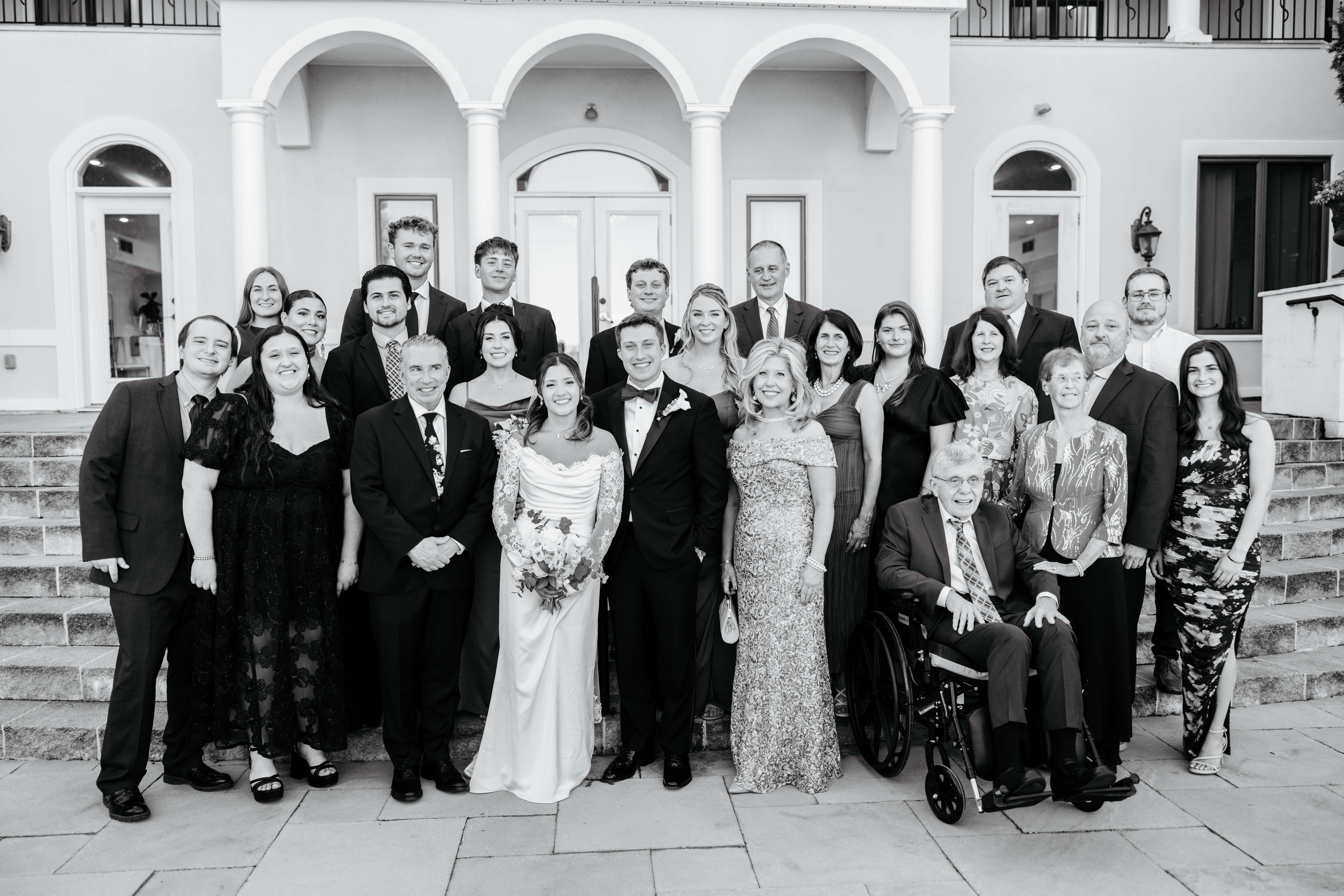 CrossKeys Vineyard Fall Wedding Photography 24 Black and white photo of bride and groom with some family and friends