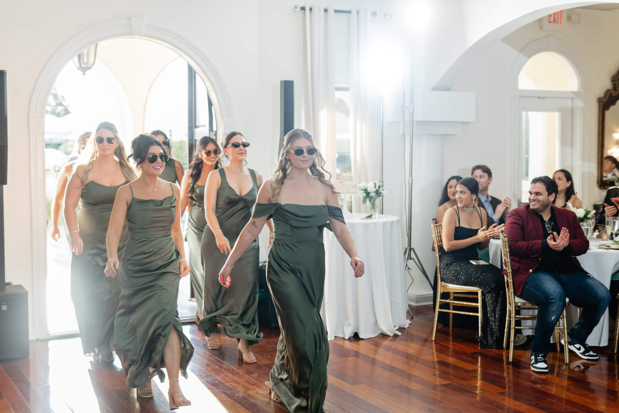 CrossKeys Vineyard Fall Wedding Photography 31 Bridesmaids enter the reception with model walks and sunglasses on