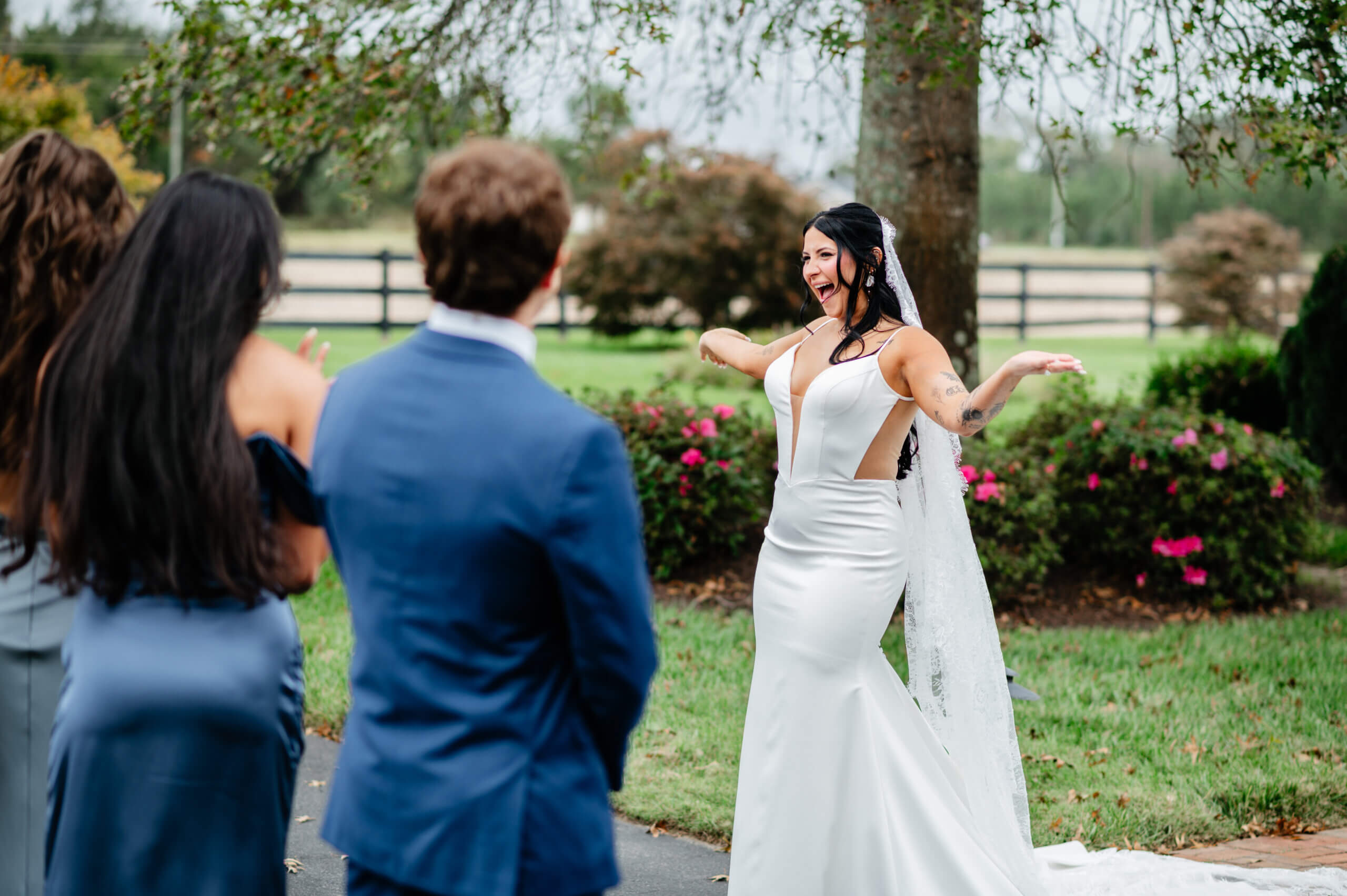 Barns of Kanak October Wedding 23 Bride smiling holding her arms out as if to say 'ta da!'