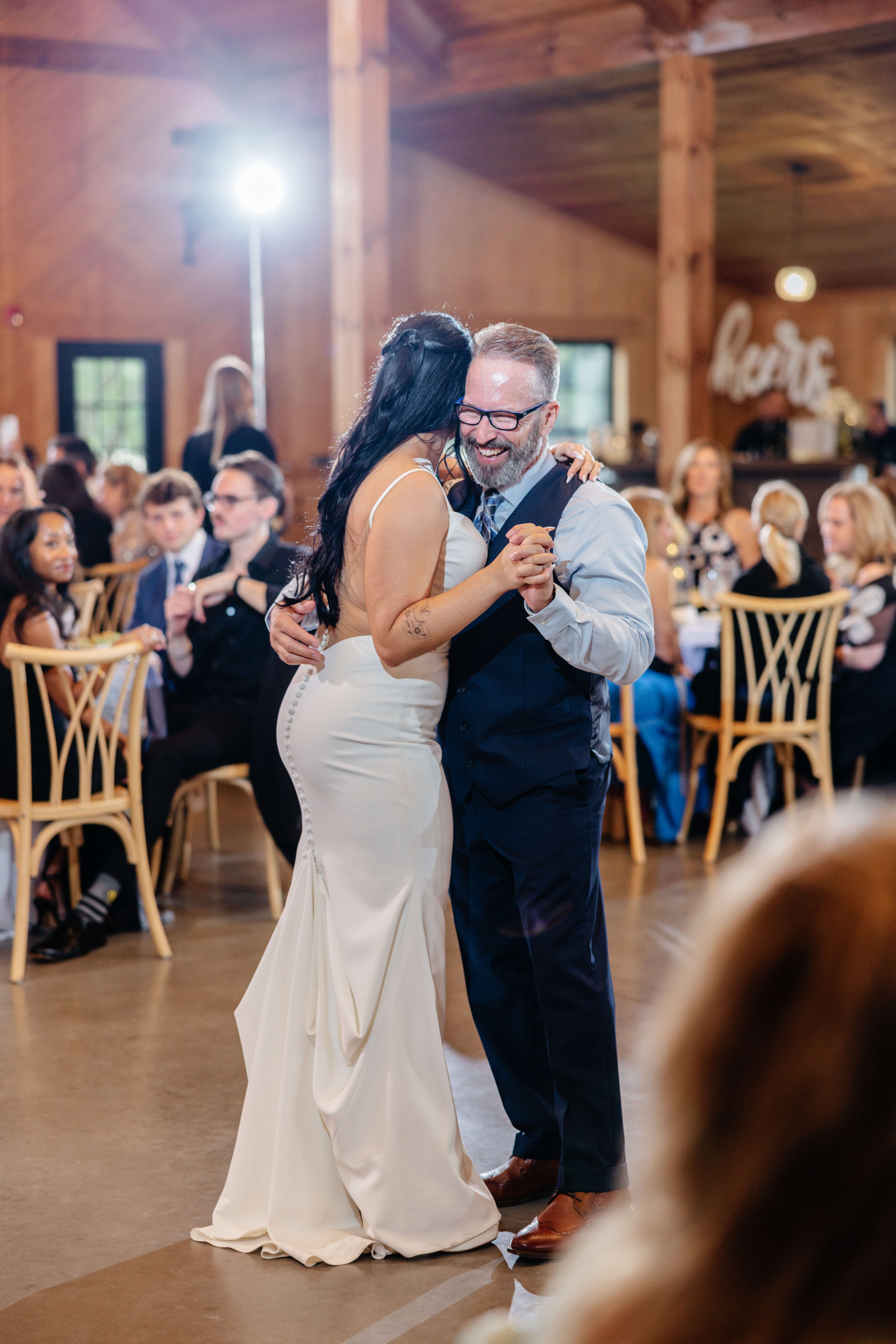 Barns of Kanak October Wedding 40 Bride dancing with her dad for the father daughter dance, dad laughing and smiling