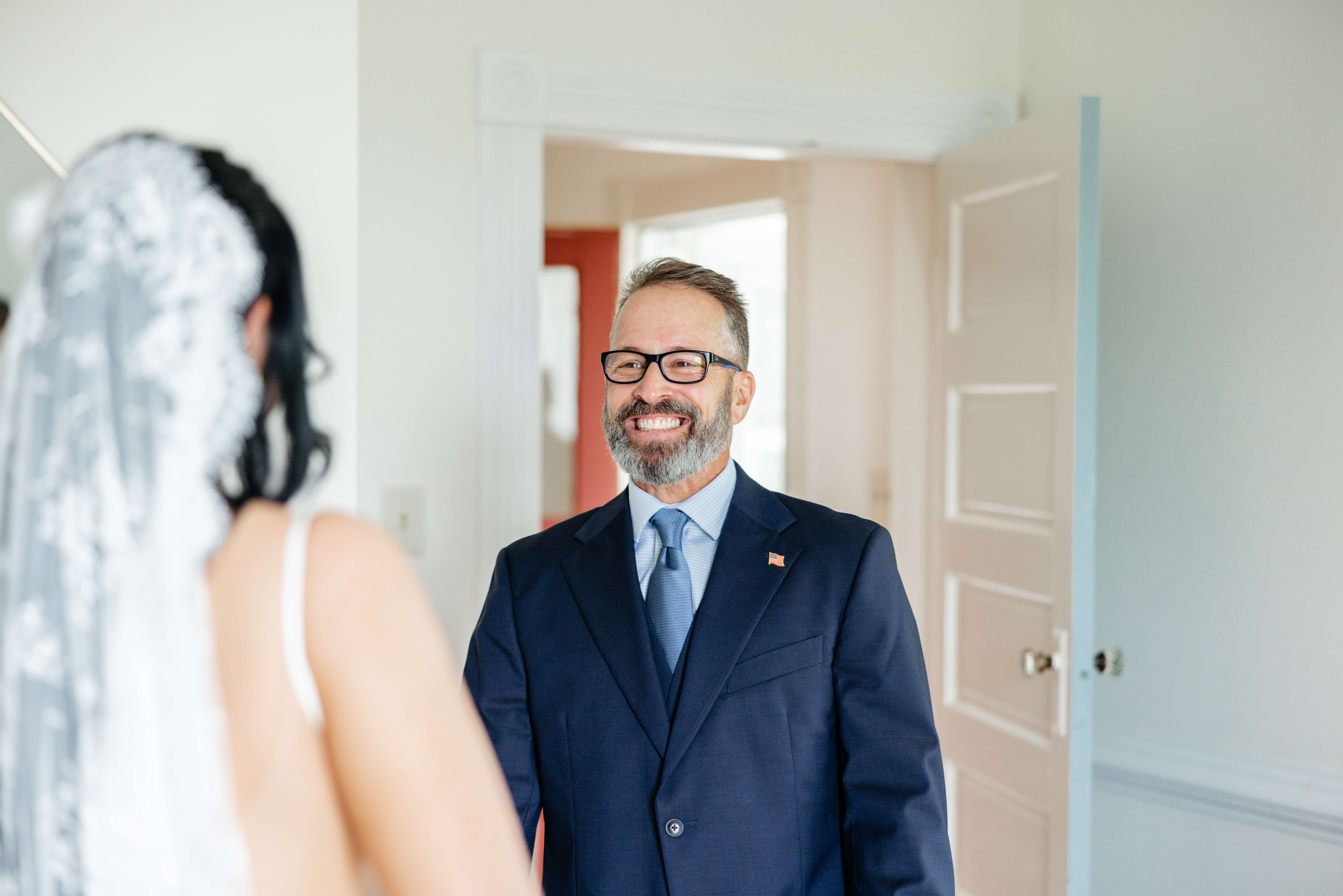 Barns of Kanak October Wedding 11 Bride's dad smiling as he sees bride in her wedding dress for first time on her wedding day