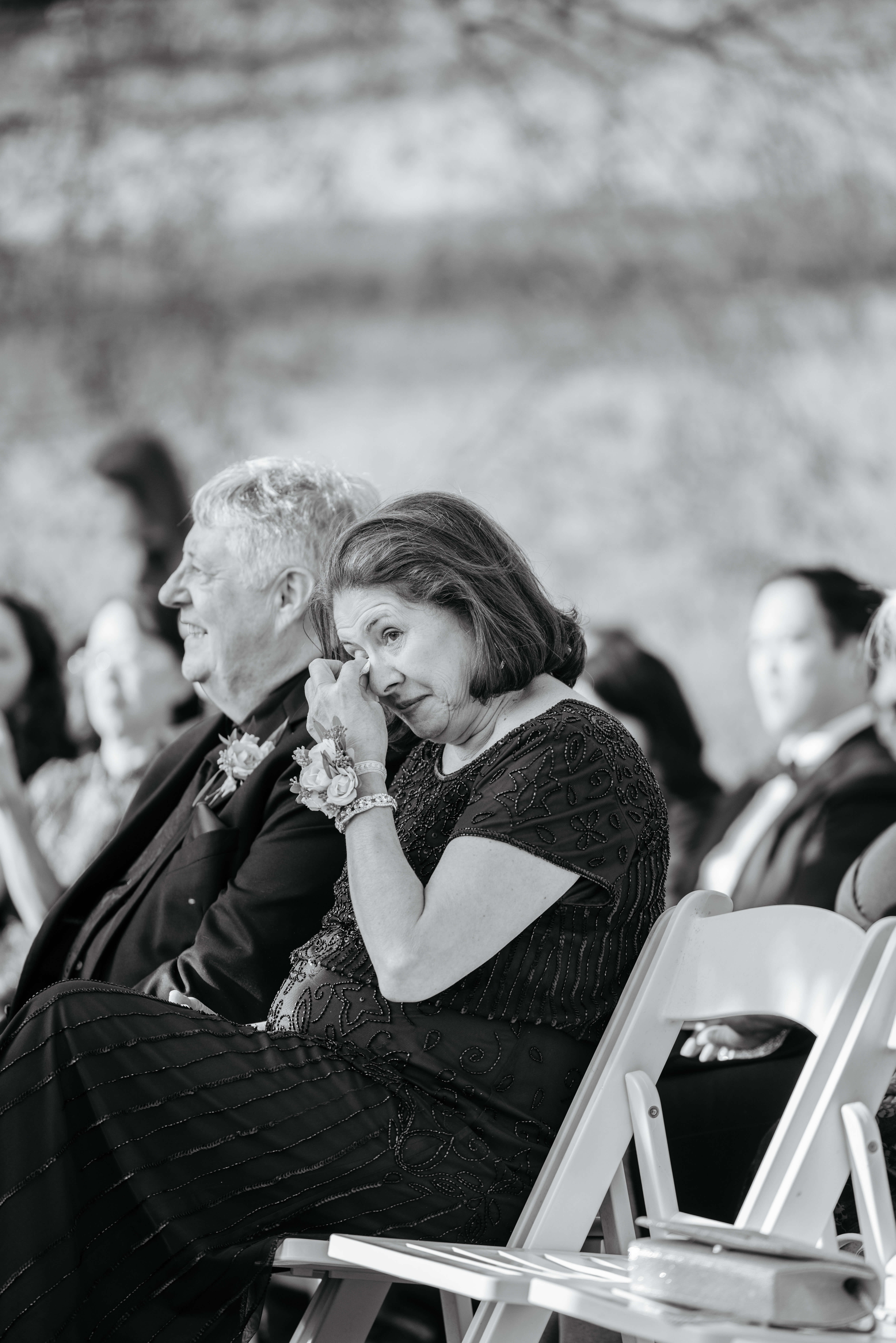 Valley Road Vineyard Fall Wedding 25 Black and white photo of groom's mom wiping a tear from her eye