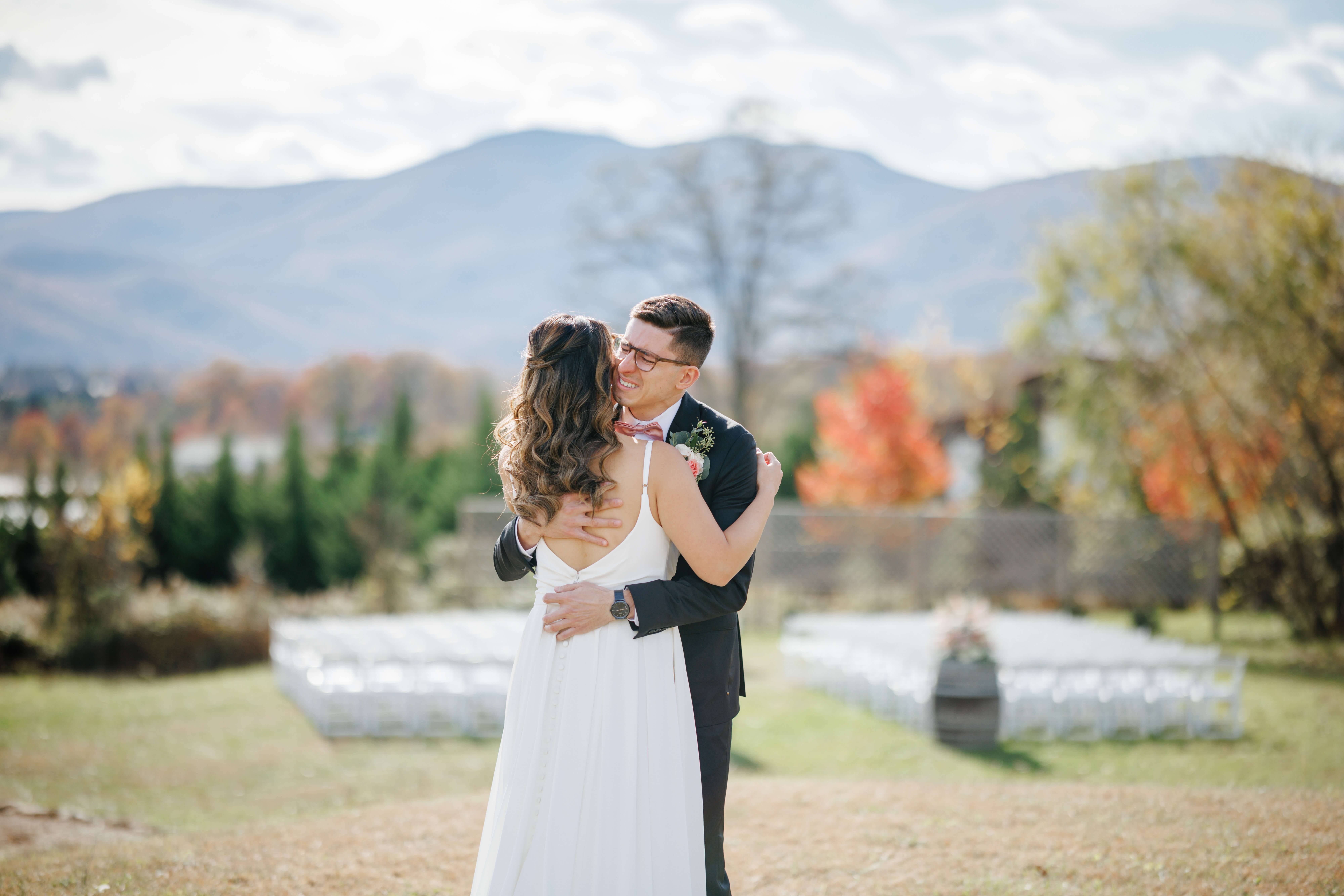 Valley Road Vineyard Fall Wedding 8 Groom hugs bride with an emotional expression on his face
