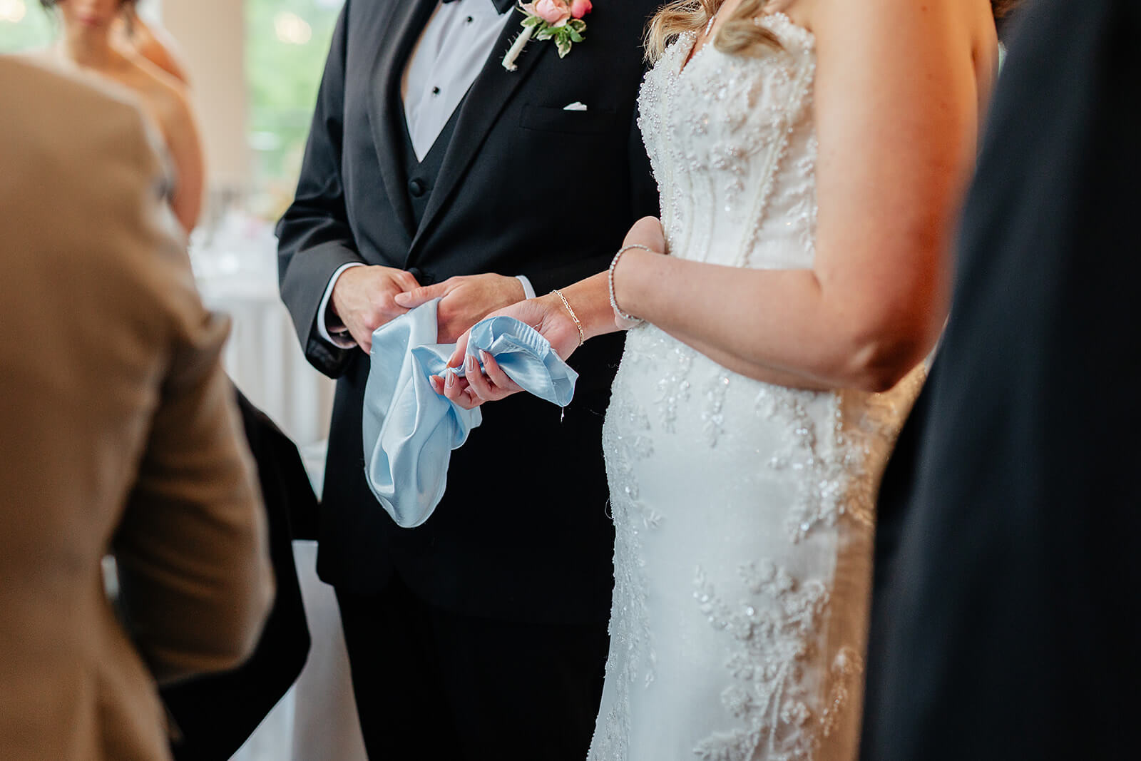 Poplar Springs Manor Spring Wedding Photography 19 bride and groom holding blue linen between them