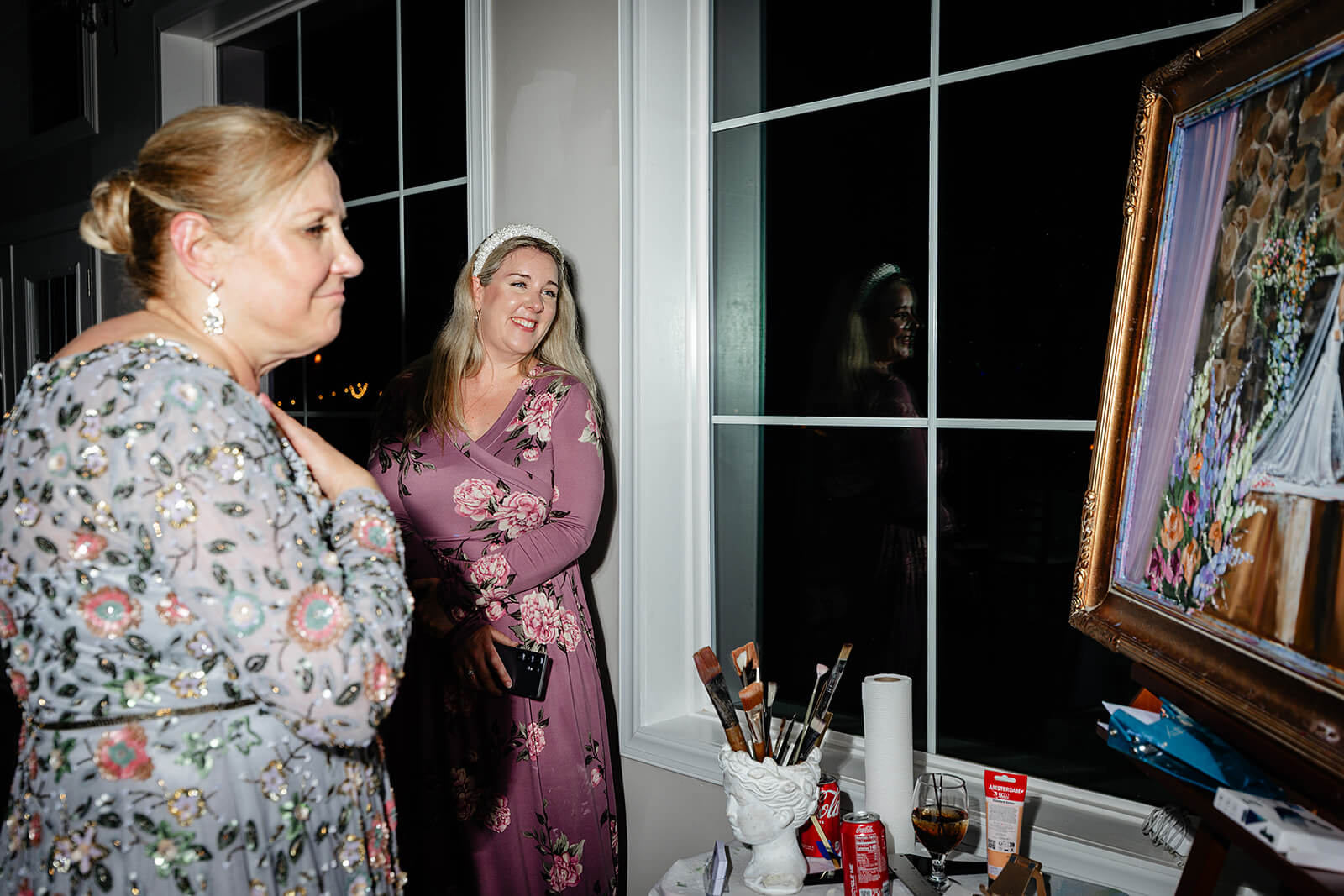 Poplar Springs Manor Spring Wedding Photography 49 guest admiring artist's painting