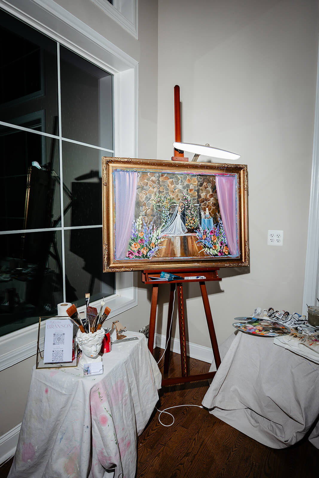 Poplar Springs Manor Spring Wedding Photography 50 corner with live painting and artist's supplies on tables