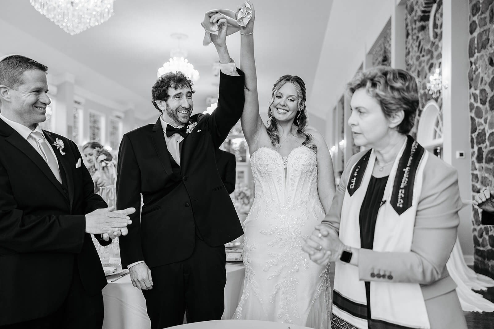 Poplar Springs Manor Spring Wedding Photography 17 black and white photo of couple being ministered their religious ceremony