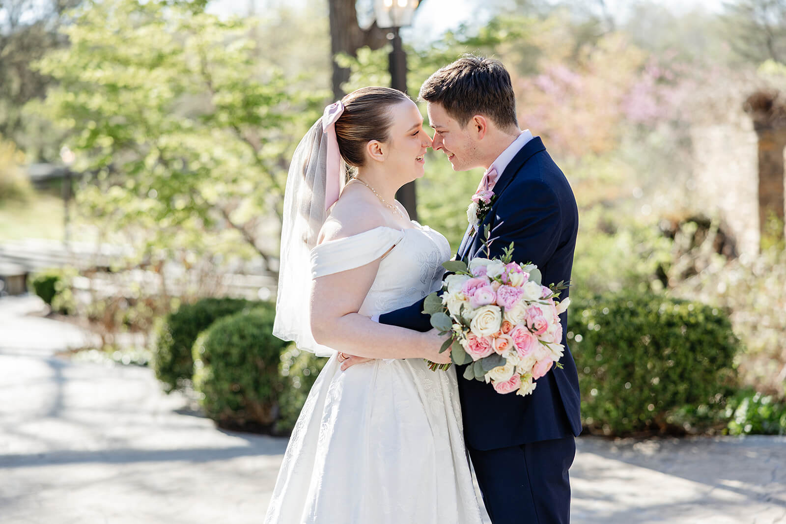 The Mill at Fine Creek Spring Wedding Photography in Powhatan 31 bride and groom standing nose to nose outside