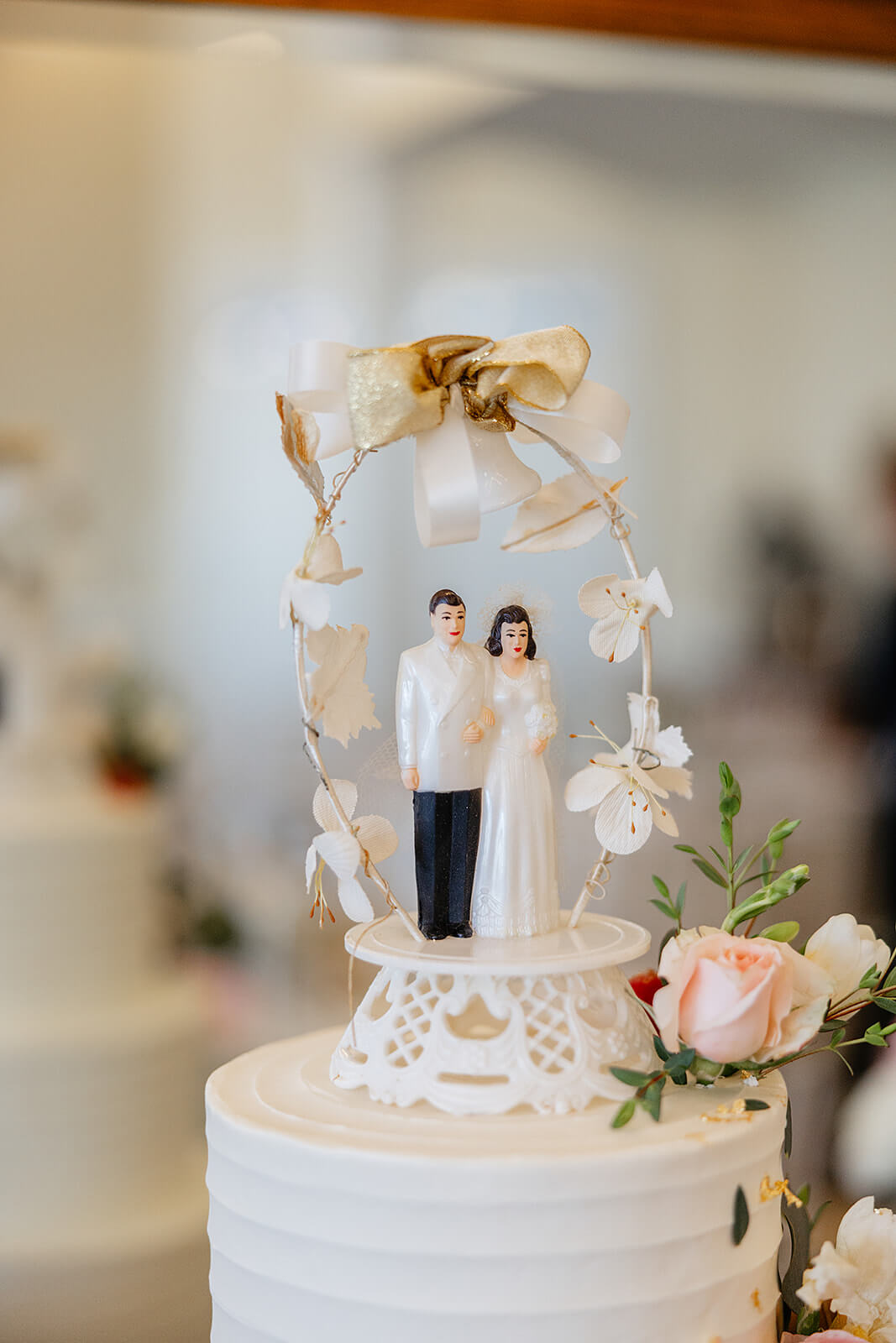 The Mill at Fine Creek Spring Wedding Photography in Powhatan 33 detail photo of bride and groom figurines standing on top of the cake