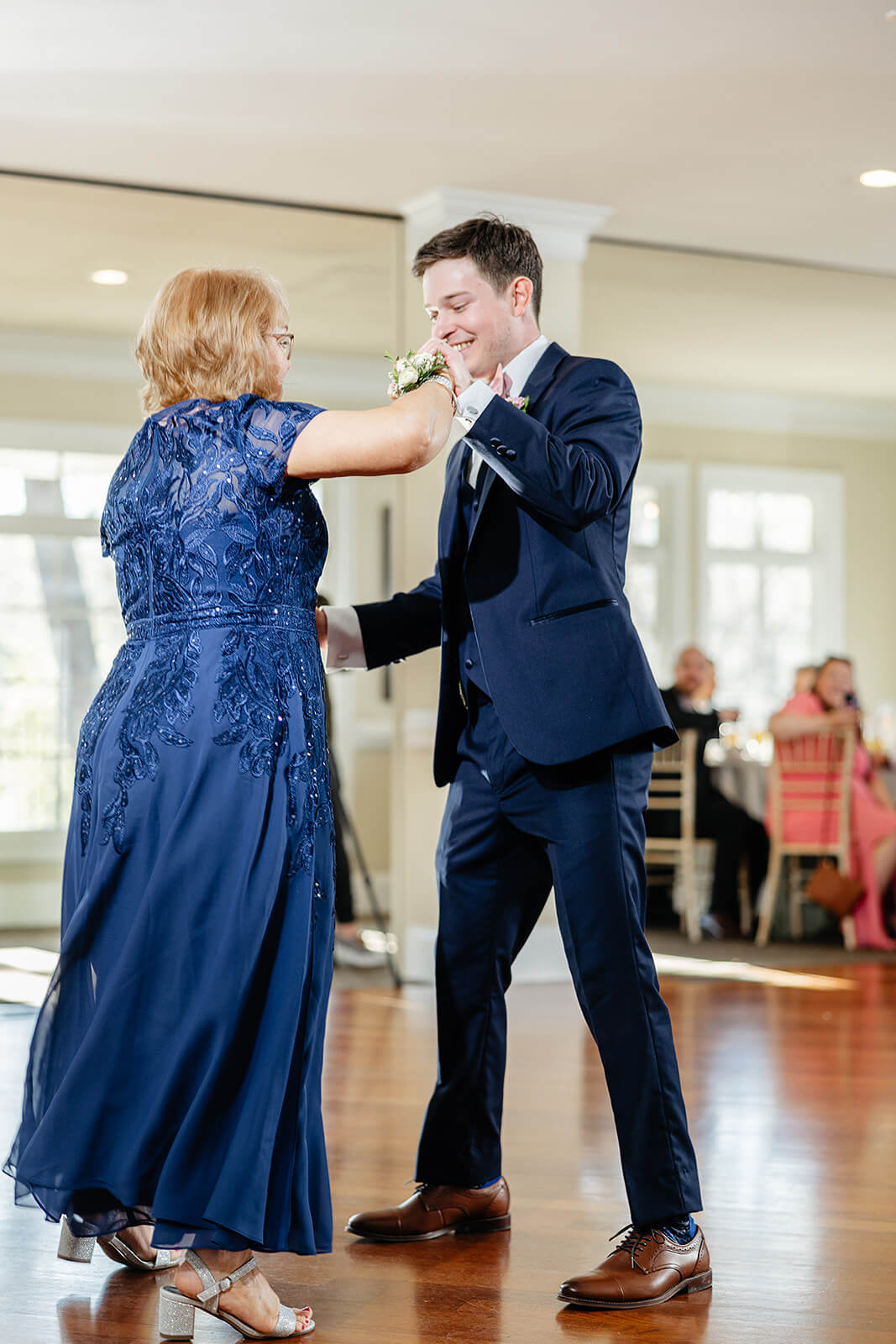 The Mill at Fine Creek Spring Wedding Photography in Powhatan 39 groom and his mother dancing together
