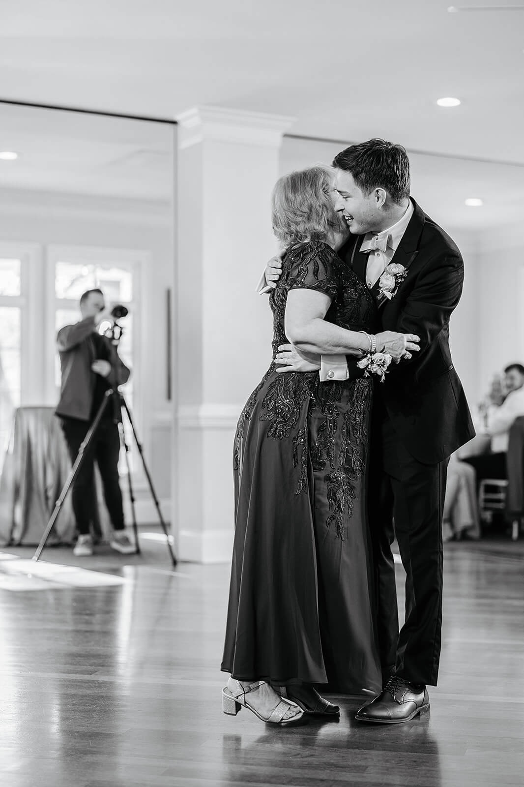 The Mill at Fine Creek Spring Wedding Photography in Powhatan 40 black and white photo of groom and his mother hugging