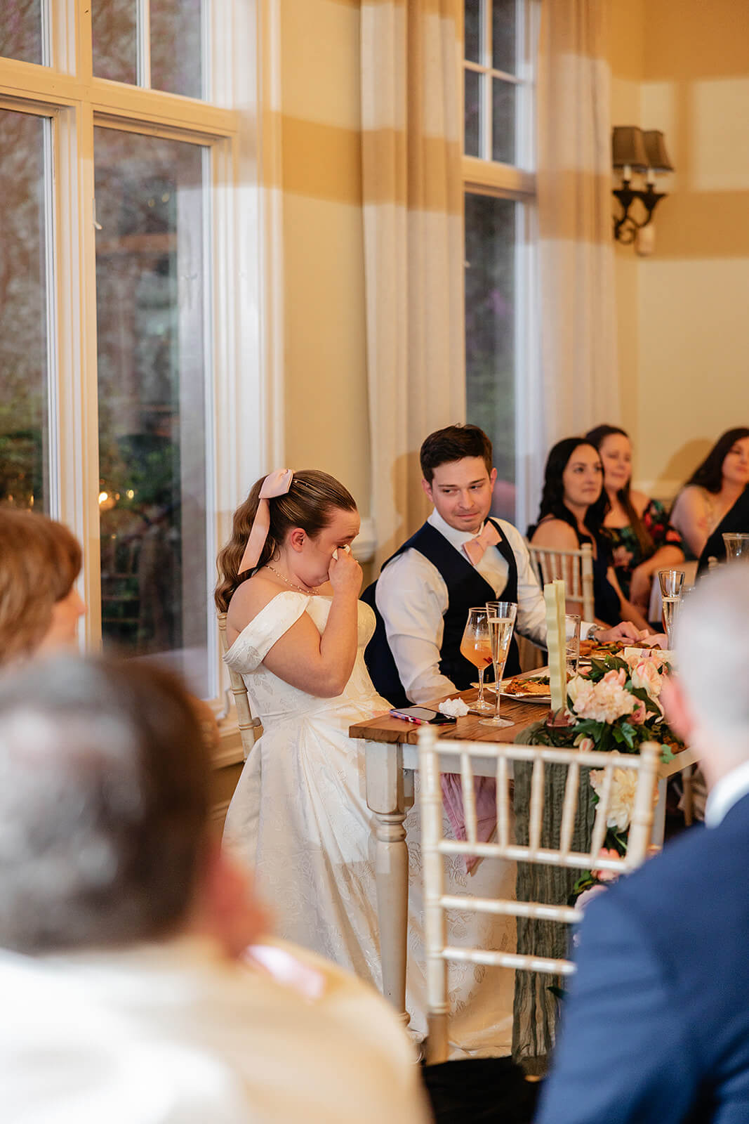 The Mill at Fine Creek Spring Wedding Photography in Powhatan 42 bride wiping tears away during a speech