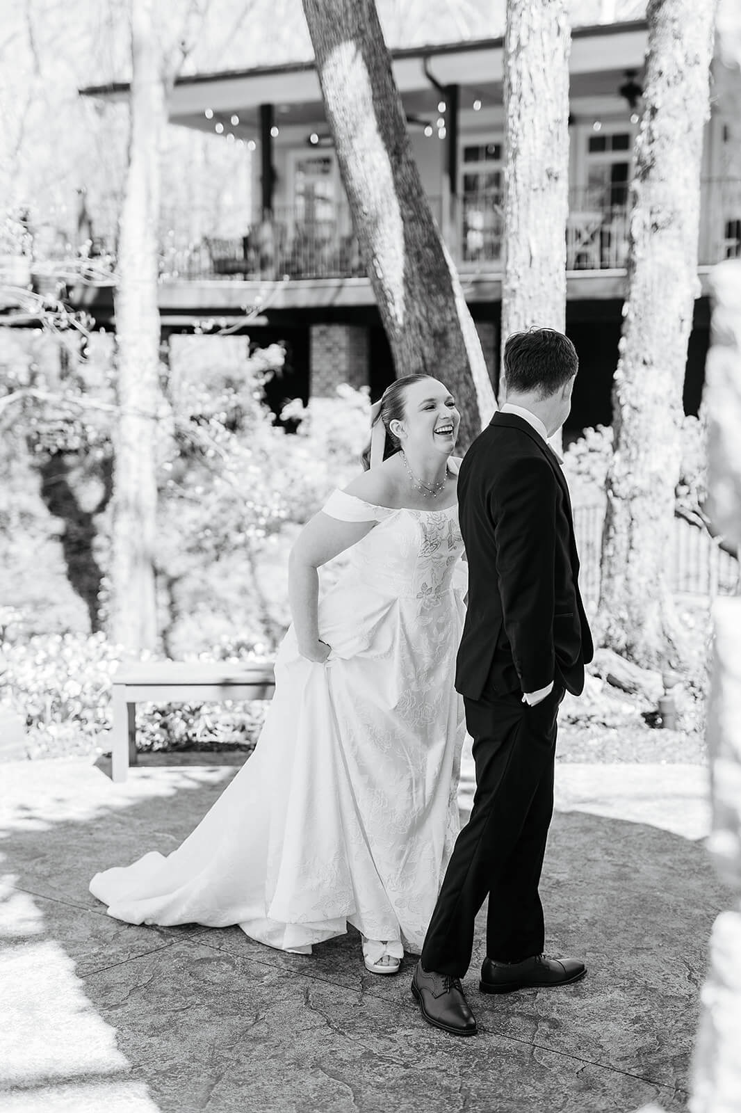 The Mill at Fine Creek Spring Wedding Photography in Powhatan 14 black and white photo of groom turning around to see his bride