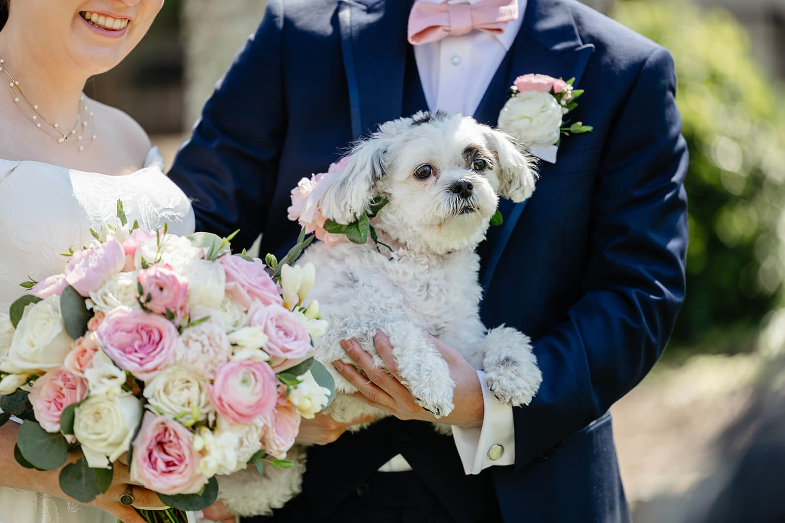 The Mill at Fine Creek Spring Wedding Photography in Powhatan 21 bride and groom holding there small, white dog
