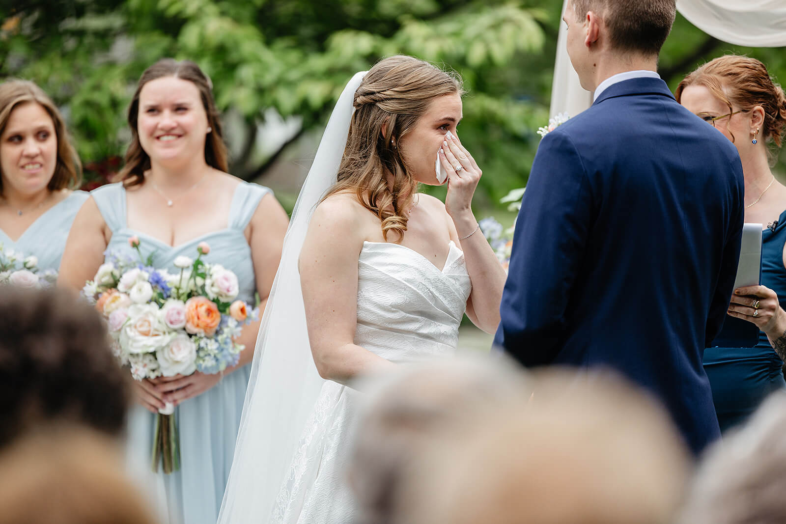Allegheny RiverTrail Park Spring Wedding Photography 20 bride wiping away tears while she stands at the alter with the groom