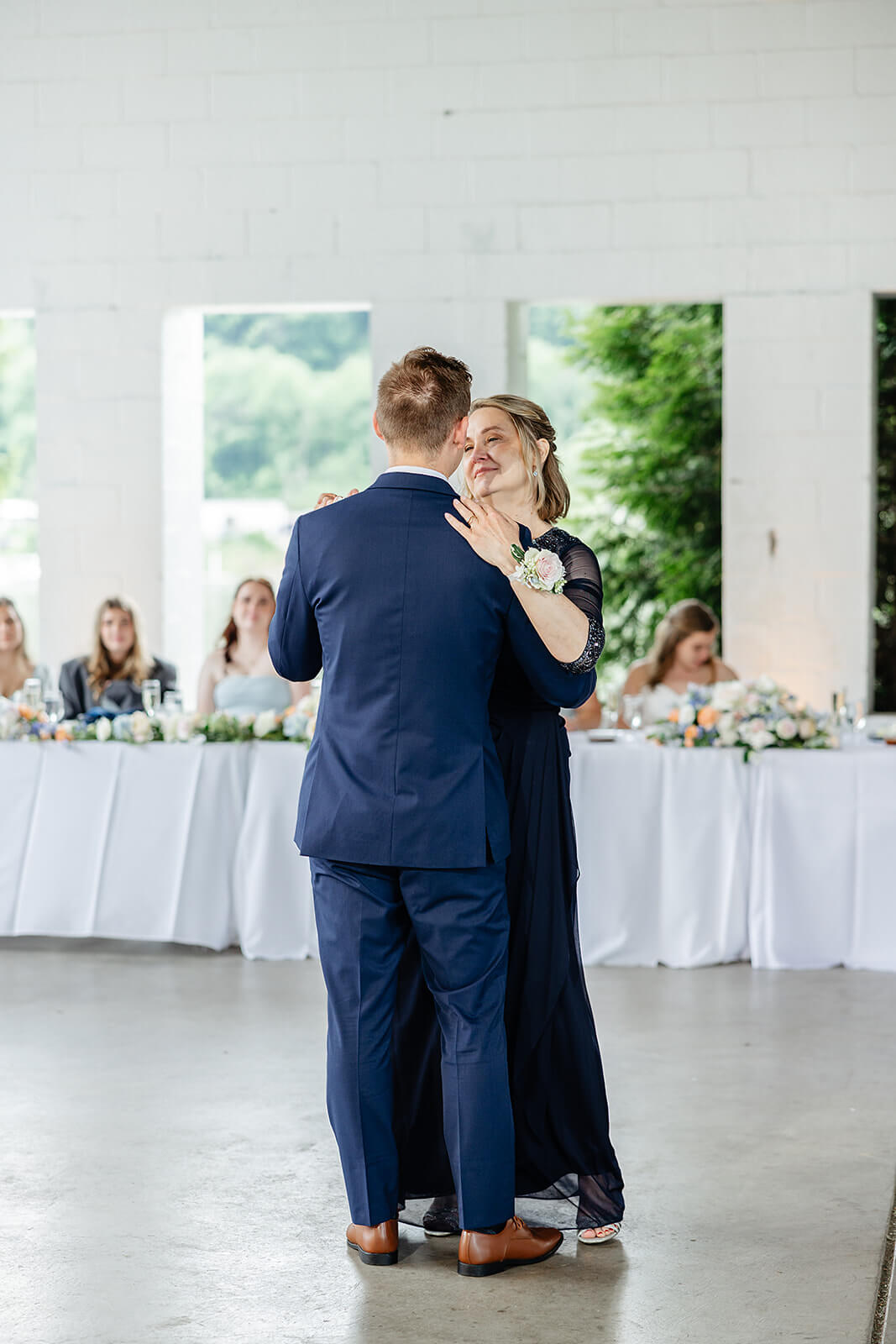 Allegheny RiverTrail Park Spring Wedding Photography 36 groom and mother dancing and smiling at each other