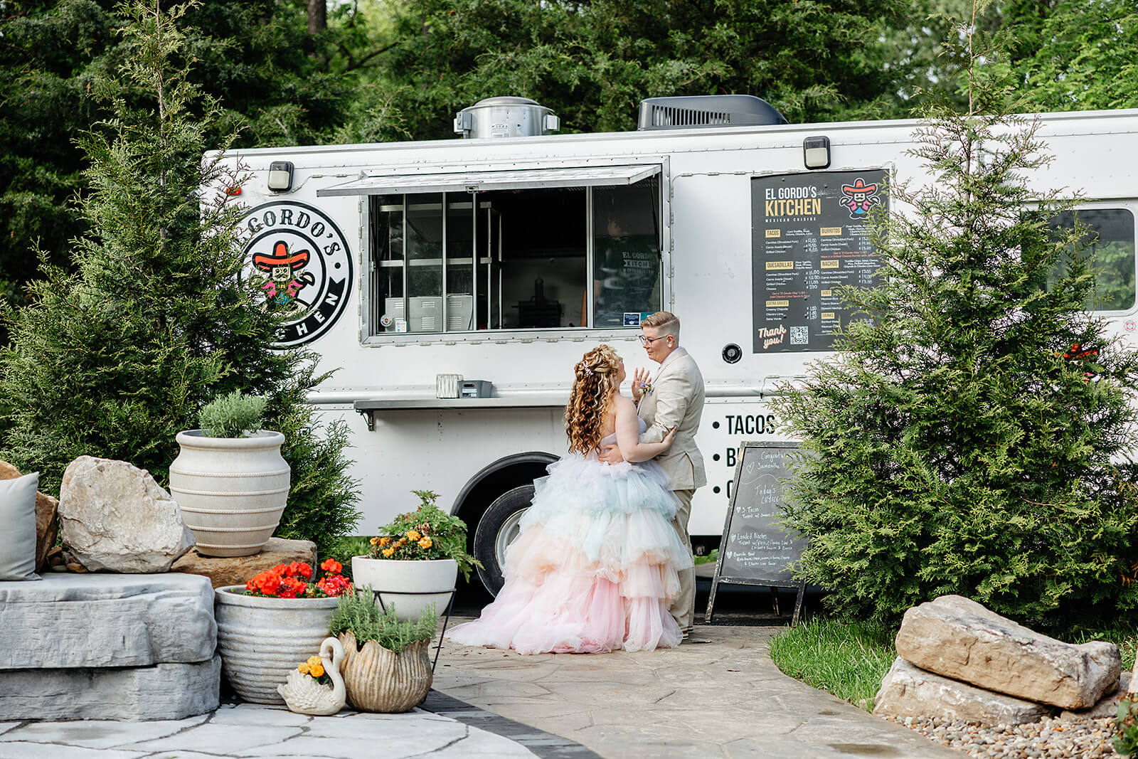 Vaughan Greenhouse Spring Wedding Photography 23 bride and groom standing in front of the food truck