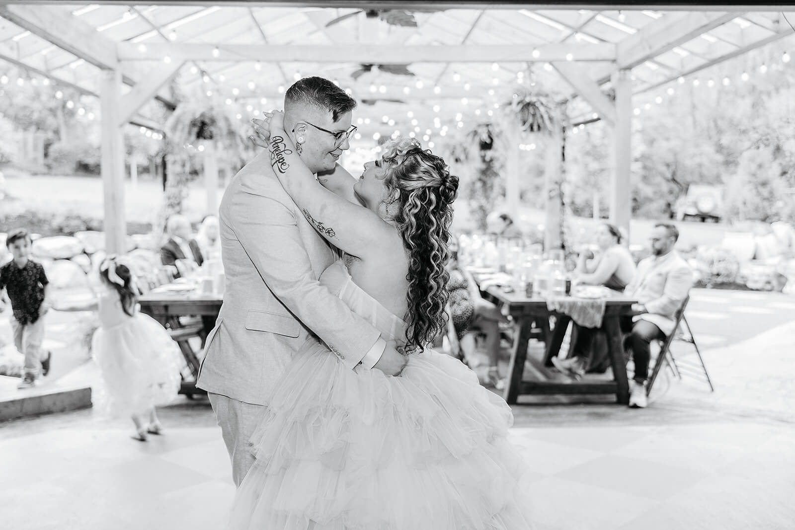 Vaughan Greenhouse Spring Wedding Photography 28 black and white photo of bride and groom dancing together