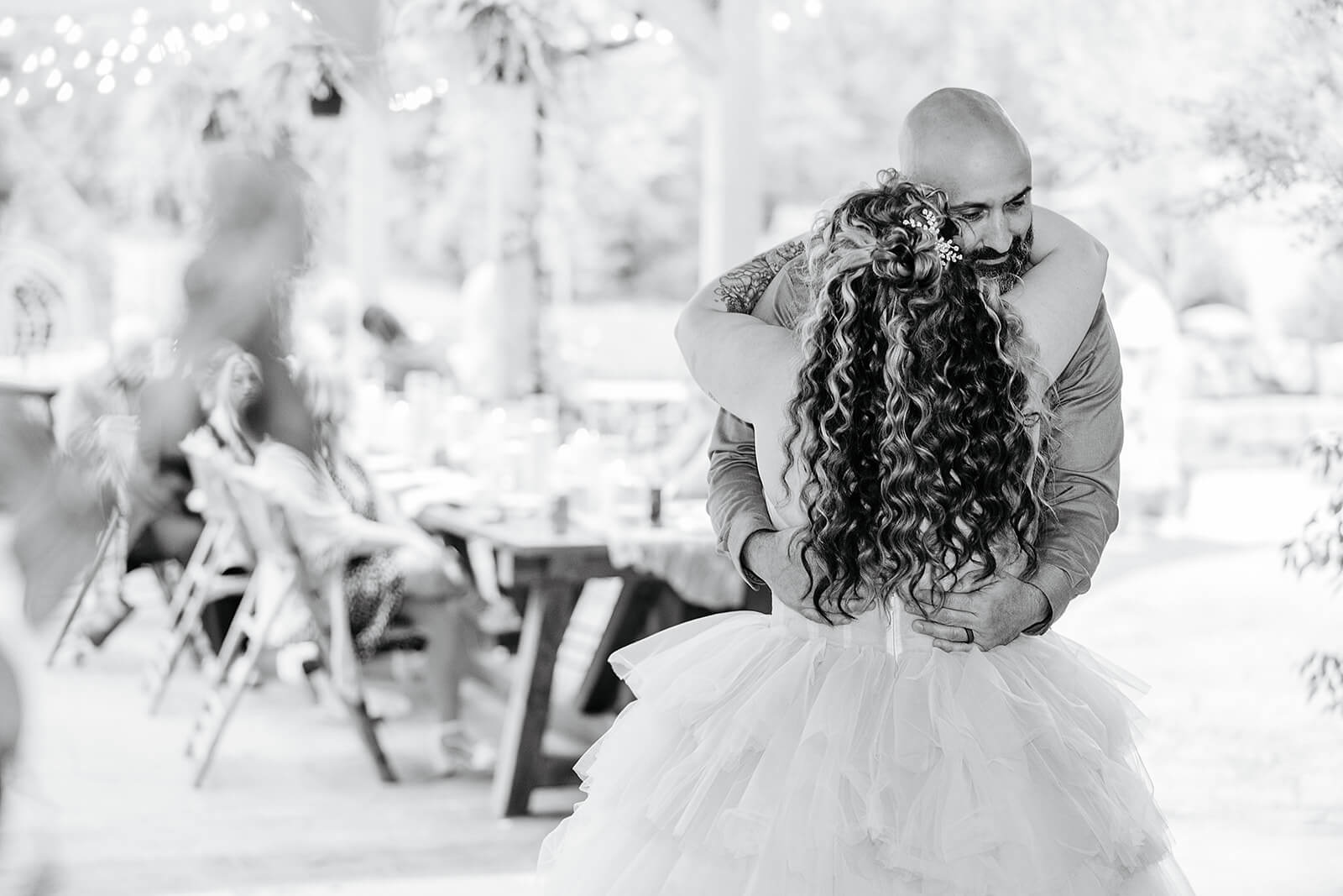 Vaughan Greenhouse Spring Wedding Photography 29 black and white photo of bride dancing with a man
