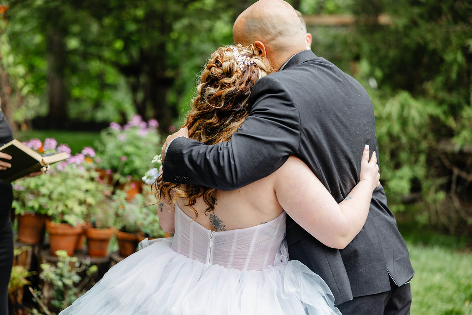 Vaughan Greenhouse Spring Wedding Photography 10 bride hugging her father