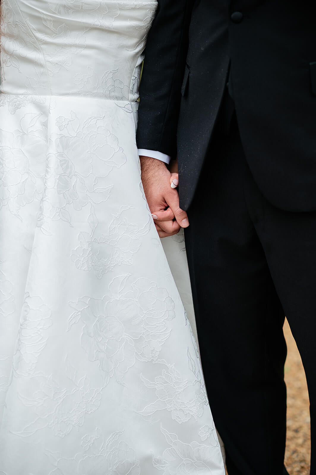 Matt + Adriana's May Wedding Photography 24 detail shot of bride and groom holding hands