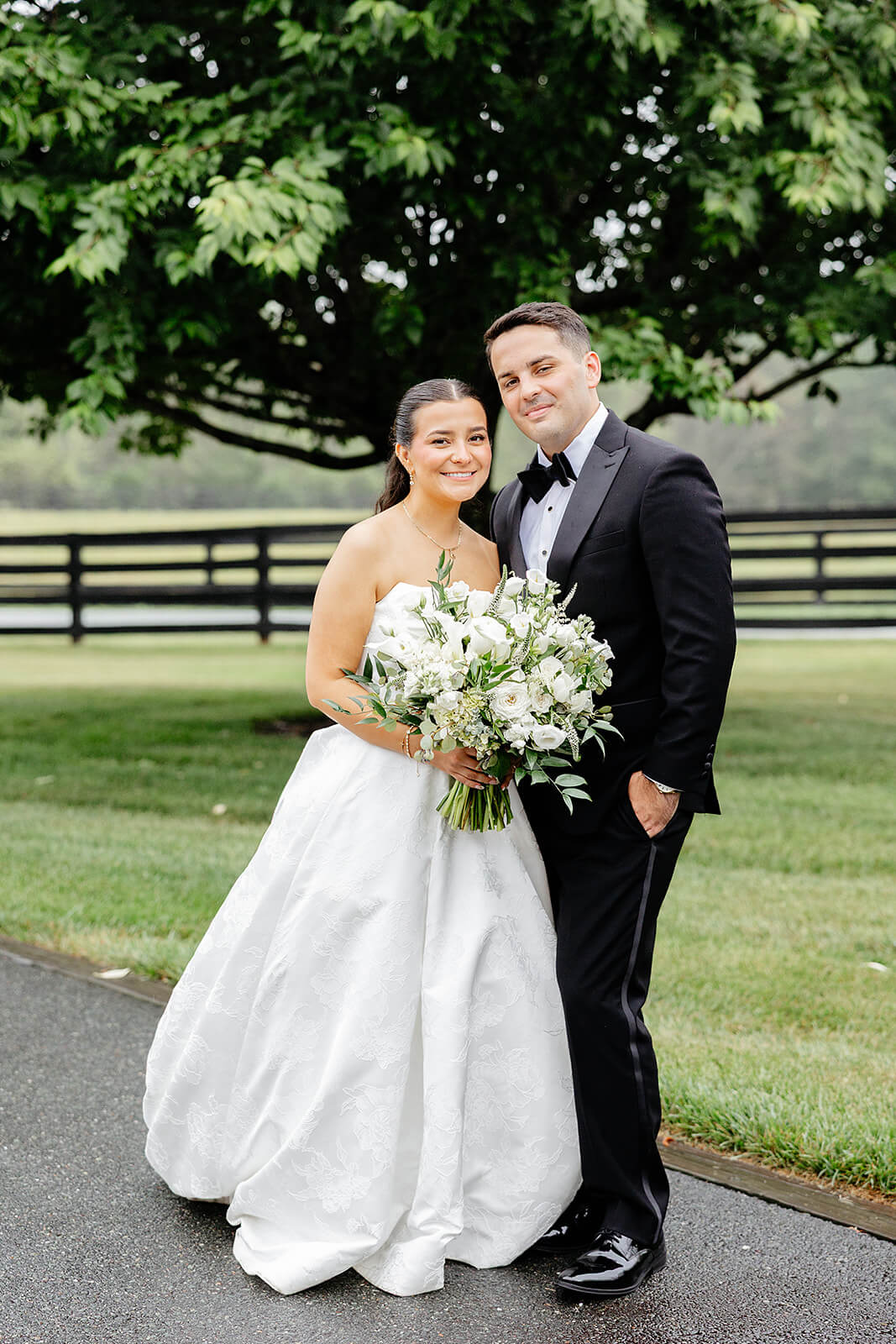 Matt + Adriana's May Wedding Photography 29 portrait of couple standing outside in front of a huge tree