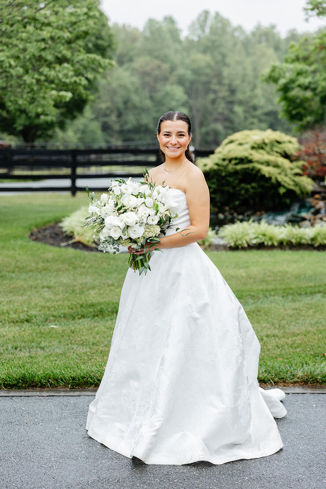 Matt + Adriana's May Wedding Photography 31 portrait of bride in her wedding dress and holding her bouquet outside