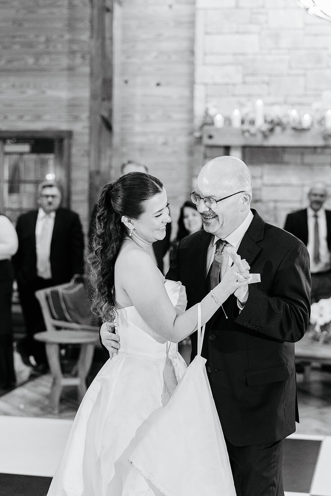 Matt + Adriana's May Wedding Photography 35 black and white photo of bride dancing with her dad on a checkered dance floor