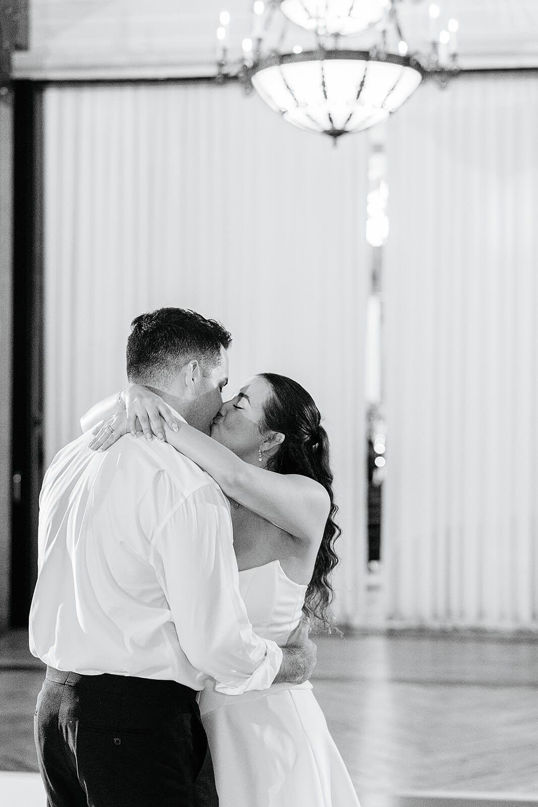 Matt + Adriana's May Wedding Photography 42 black and white photo of bride kissing groom and the dance together