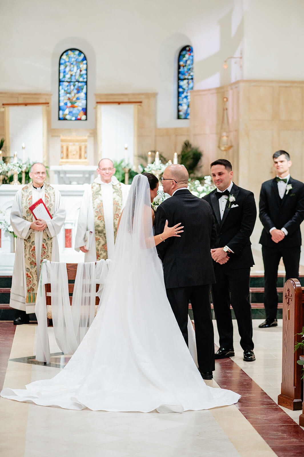 Matt + Adriana's May Wedding Photography 8 bride at the alter hugging her dad before her vows