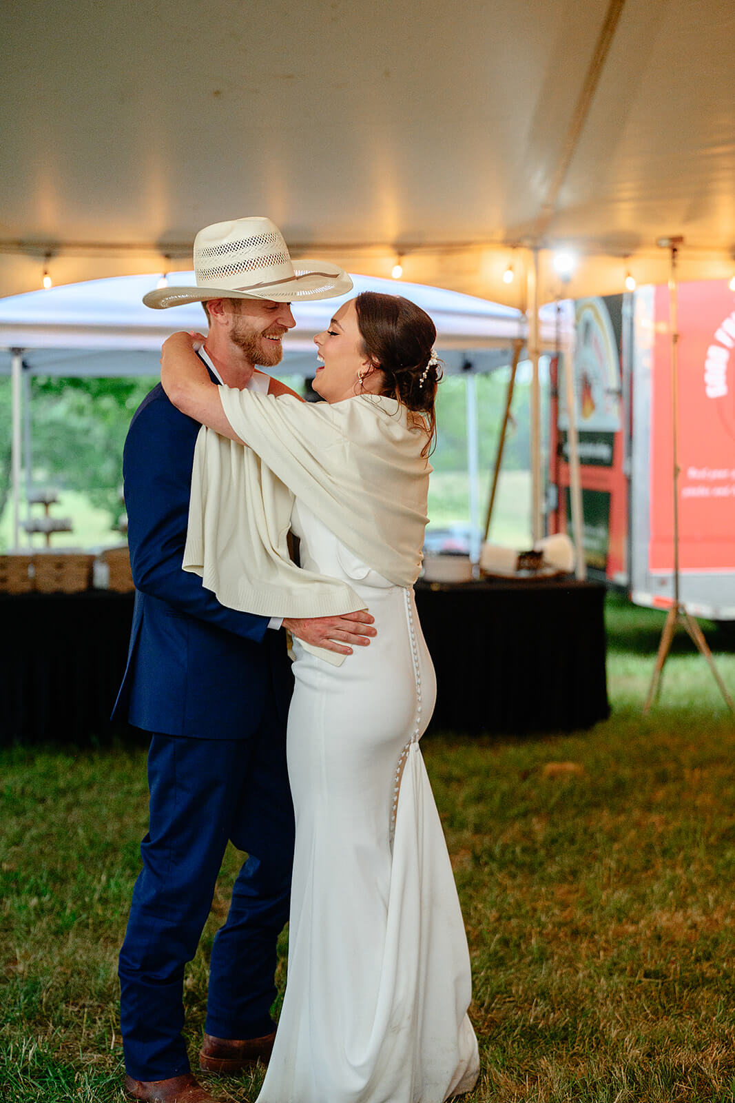 Family Farm Spring Wedding Photography 41 bride and groom laughing and dancing together