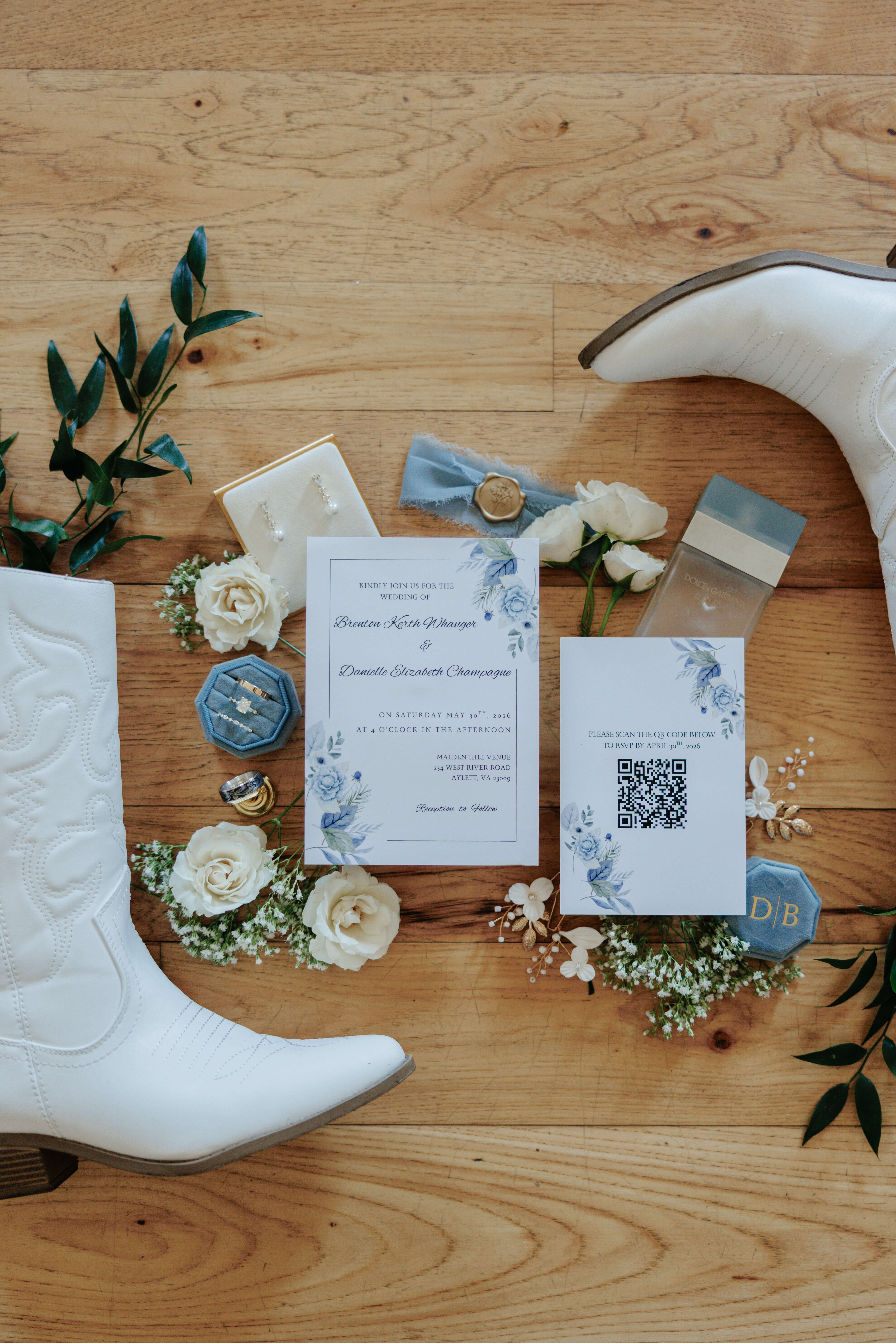 Malden Hill Spring Wedding Photography 1 detail photo of brides white cowgirl boots with invitation and florals around it