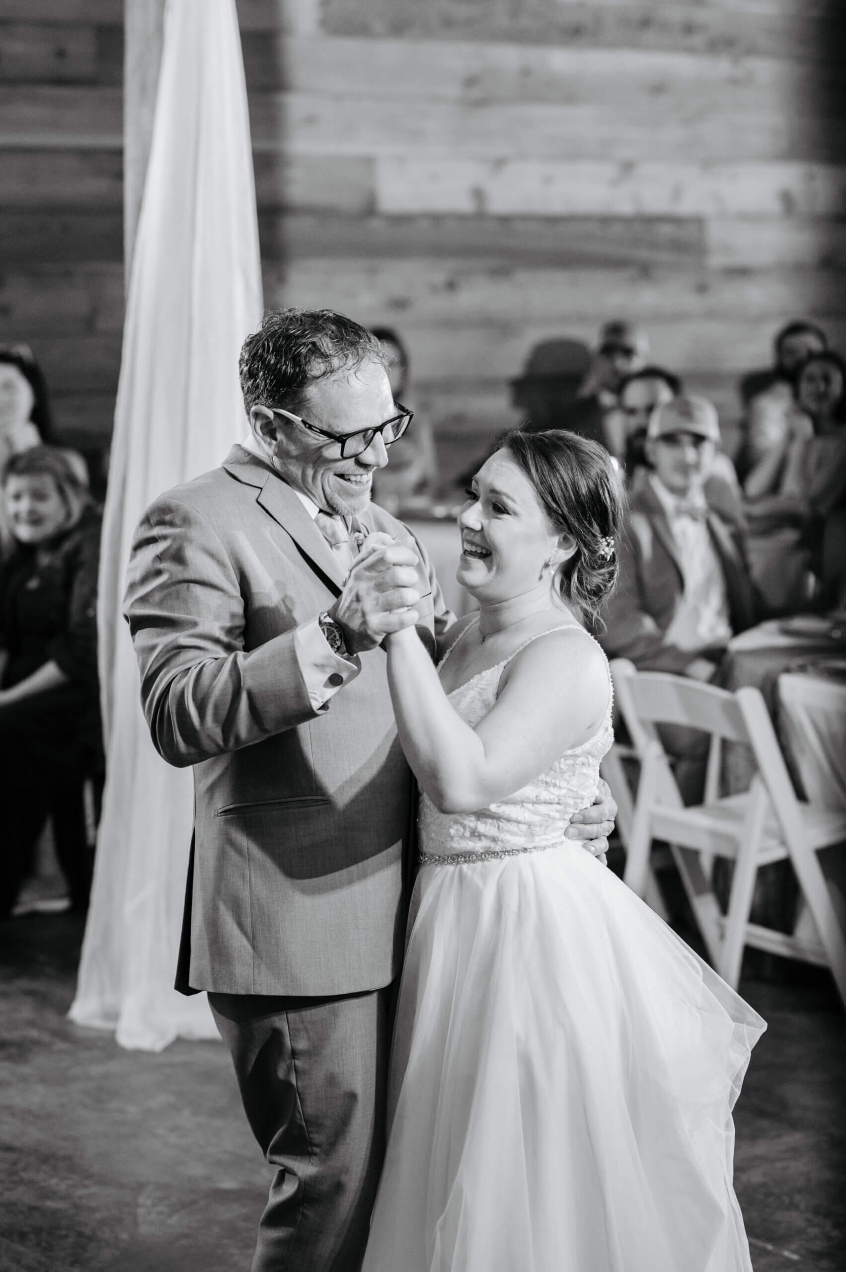 Malden Hill Spring Wedding Photography 23 black and white photo of bride dancing with her father