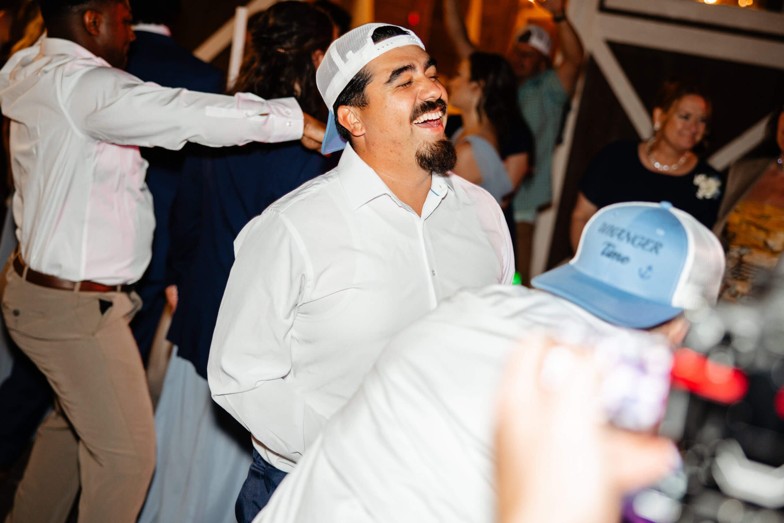 Malden Hill Spring Wedding Photography 46 guest on the dance floor laughing