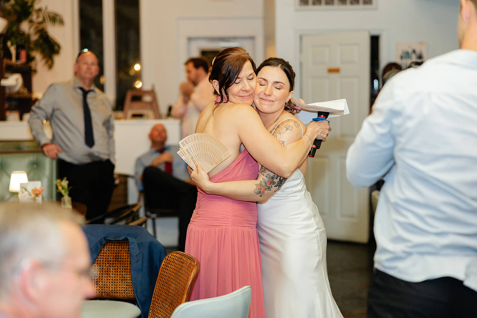 Laura Lee's Spring Wedding Photography 29 bride hugging her mom after her speech