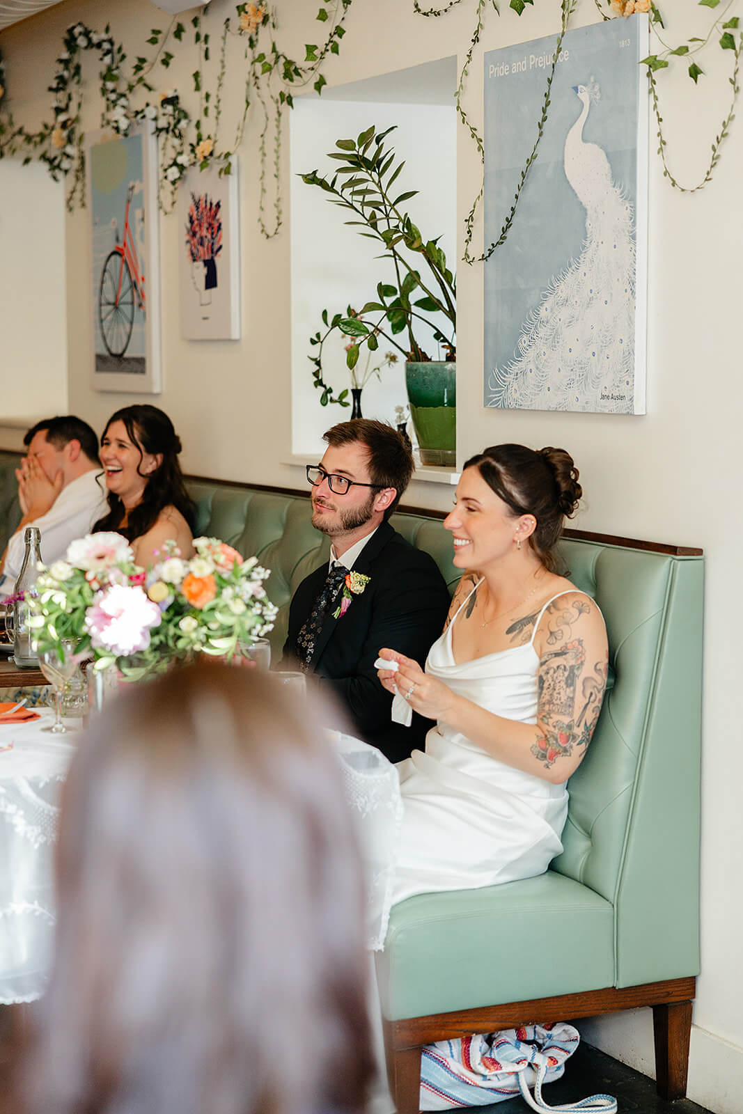 Laura Lee's Spring Wedding Photography 18 bride laughing as she listens to speech
