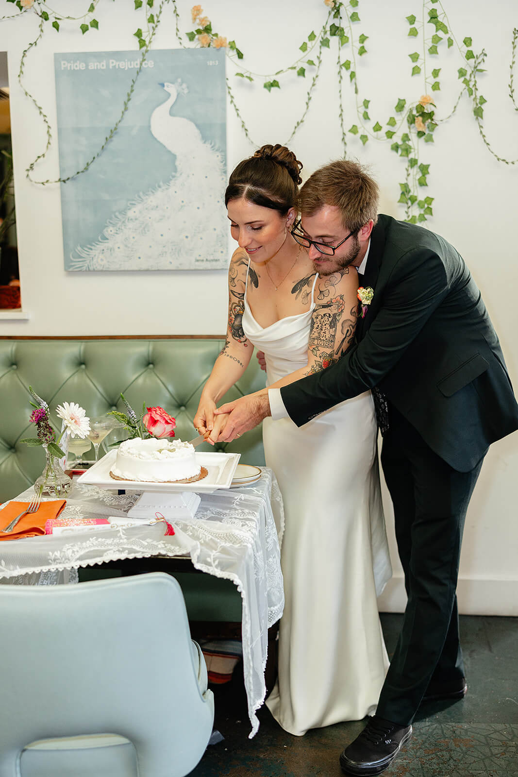Laura Lee's Spring Wedding Photography 20 bride and groom cutting their cake together