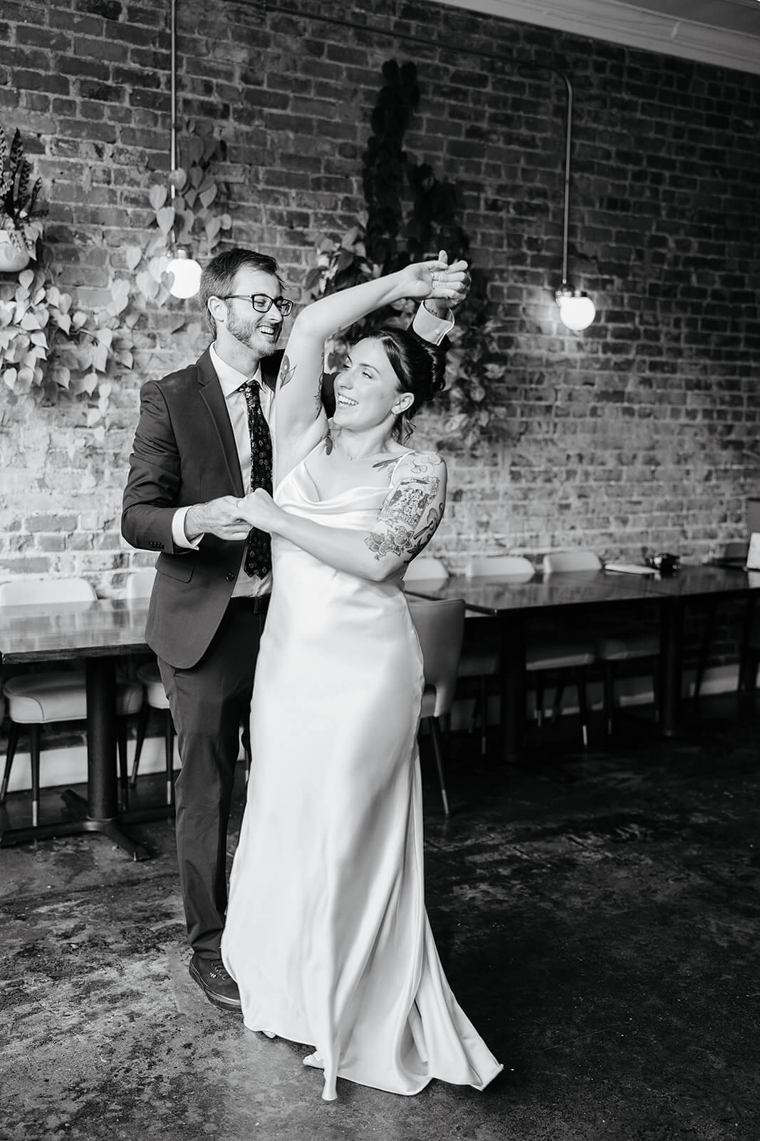 Laura Lee's Spring Wedding Photography 23 black and white photo of bride and groom dancing together