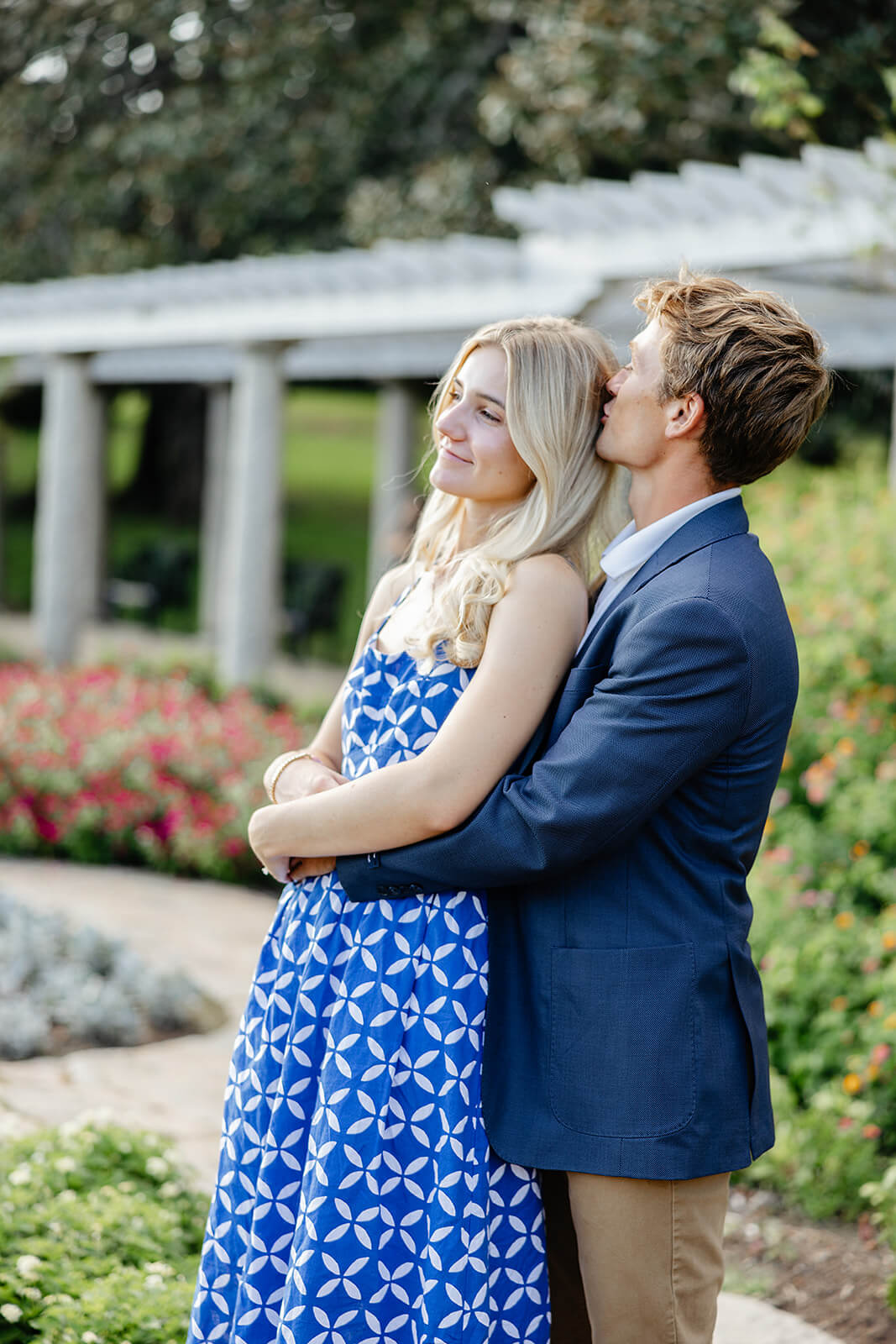Maymont Summer Engagement Photography 5 couple hugging while standing in beautiful garden