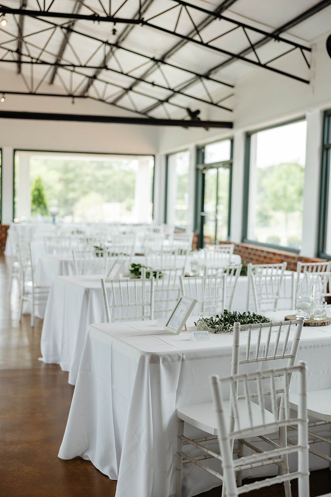Rassawek Vineyard Spring Wedding Photography 18 reception area with white tables clothes and chairs in rows